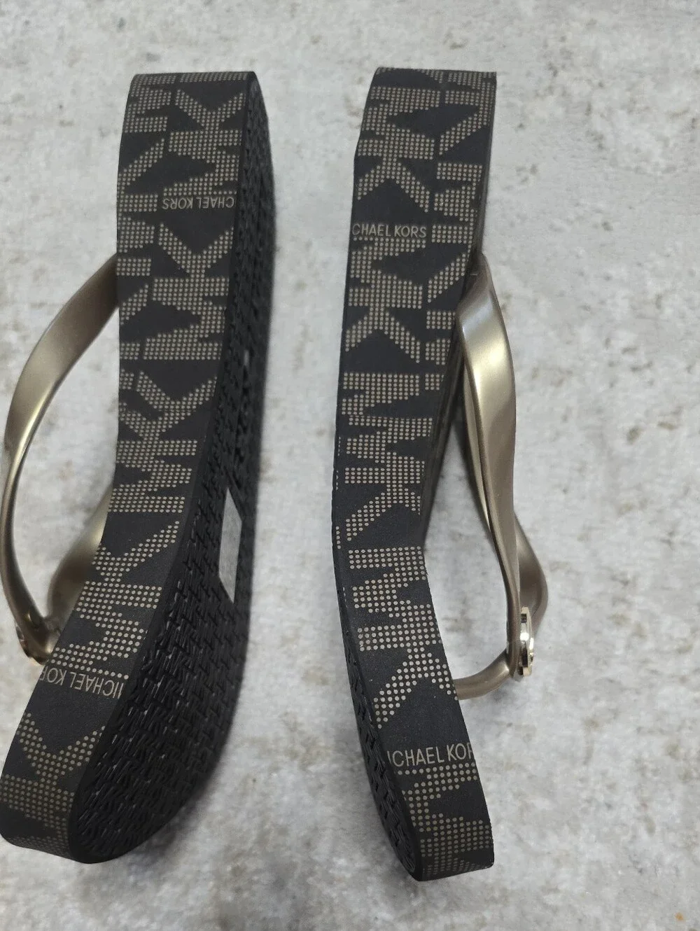 NWOT Michael Kors Black Footbed Flip Flops with Gold Straps